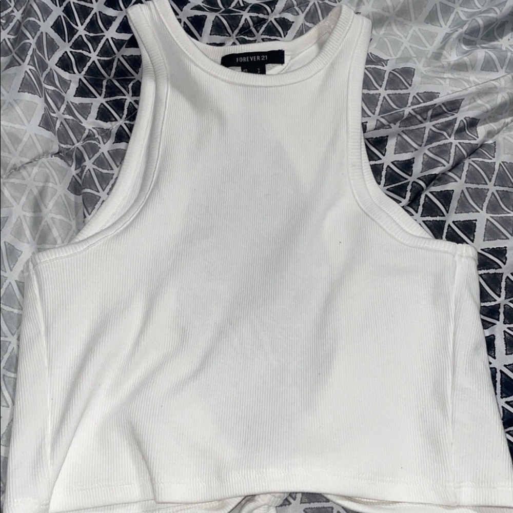 forever 21 size small. white tank crop. ties in the back